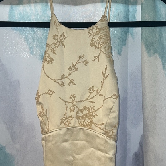 Ivory/cream dress with spaghetti straps and a zipper in the back. Gently used. - Picture 5 of 11